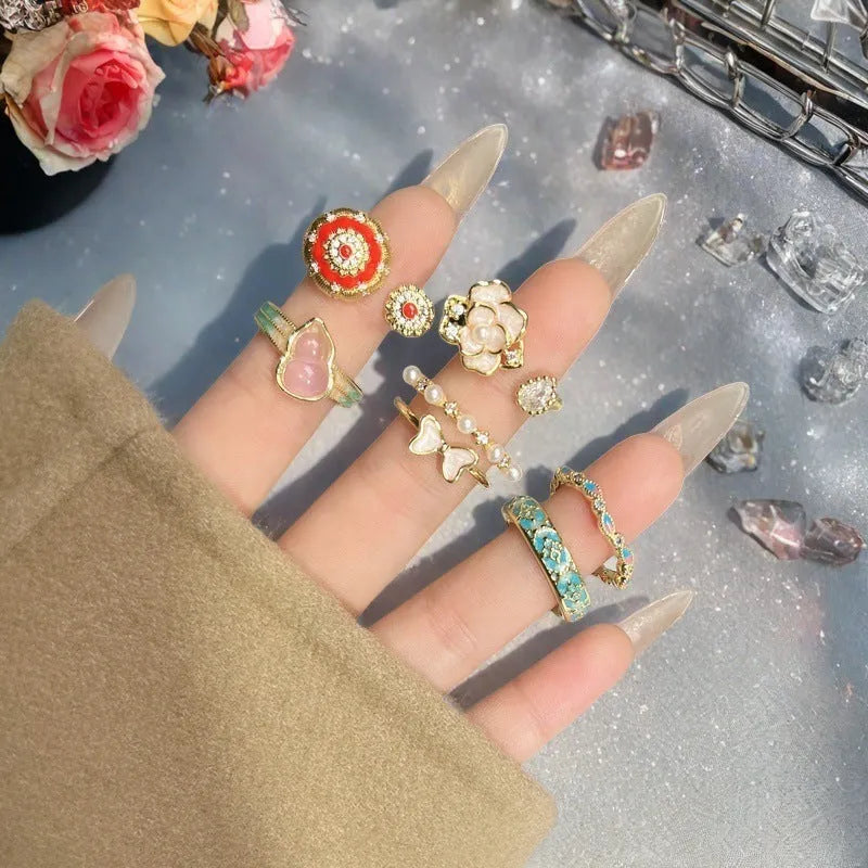 Adjustable copper ring with gourd motif, flower and bow shapes, zircon stones in six colour options