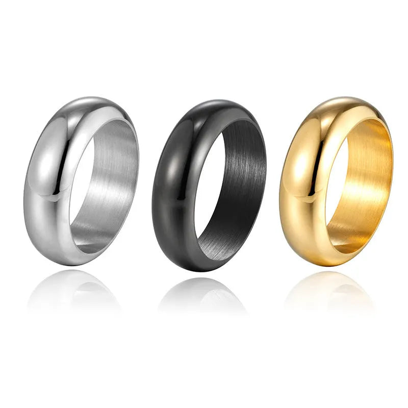 Glossy electroplated titanium steel ring shown in gold, black, and steel colour options on a plain background.