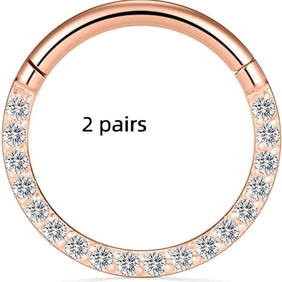 Stainless steel nose ring jewellery set showing multiple size options and colour variations including black, gold, and rose gold finishes