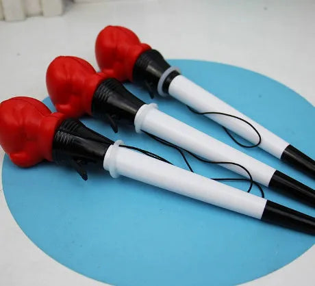 Set of four black and silver boxing press ejection pens with 0.7mm bullet tips displayed on a white surface.