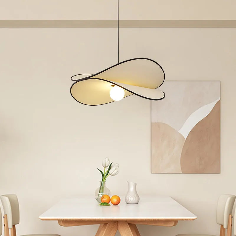 French artistic pendant light with textured fabric potato chip shade in modern simplicity style