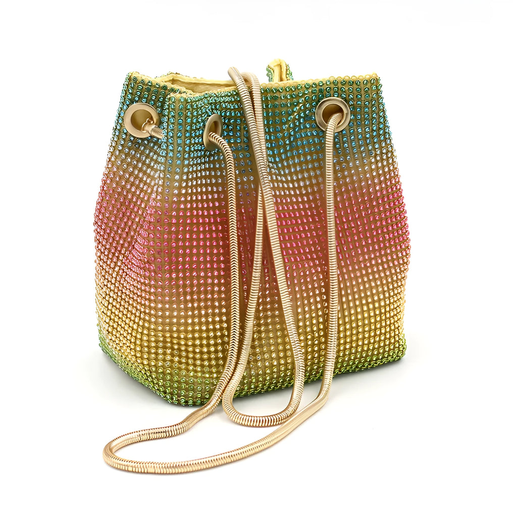 Rainbow rhinestone bucket bag with glittering crystals and a metal chain strap.