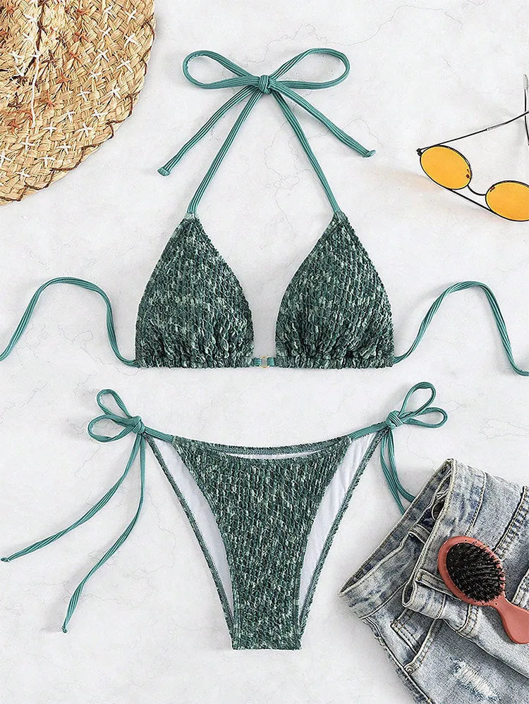 Green women's backless halter swimsuit bikini set with matching shorts