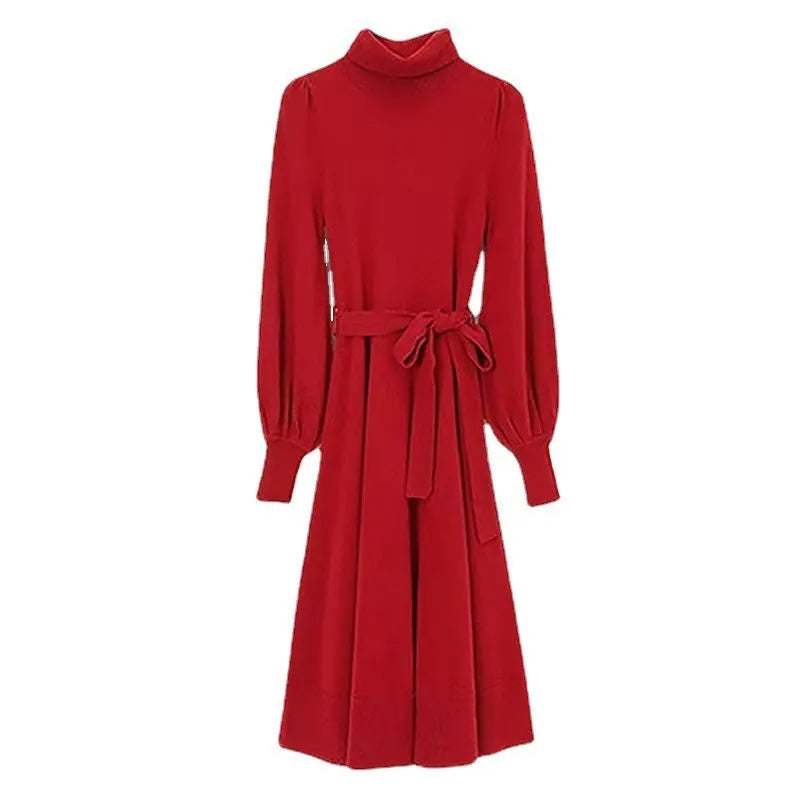 Rose red turtleneck knit dress with long sleeves, elastic waist, and a loose flowing mid-length skirt.