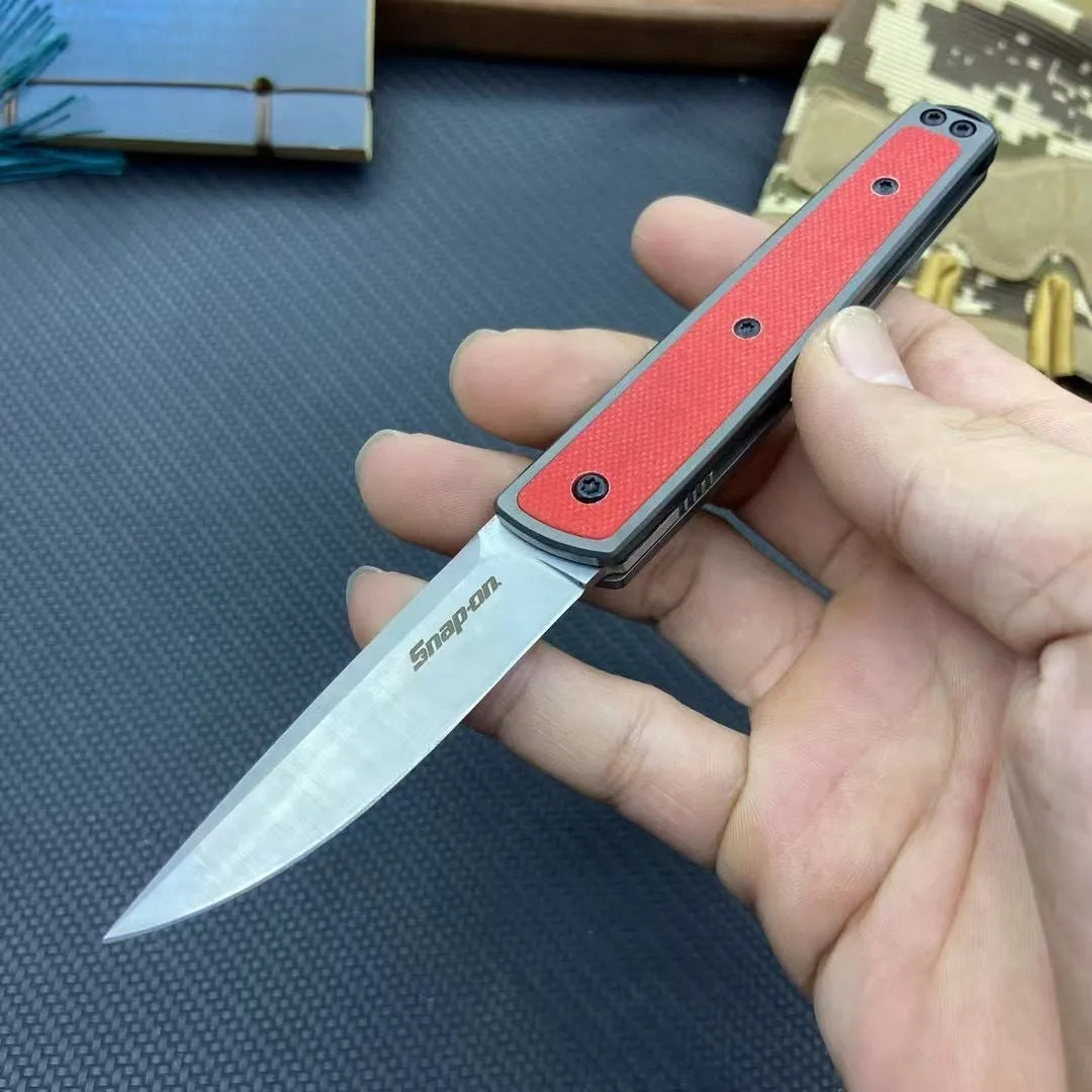 Folding fruit knife with stainless steel blade in black, coffee, or red colour measuring 17cm total length