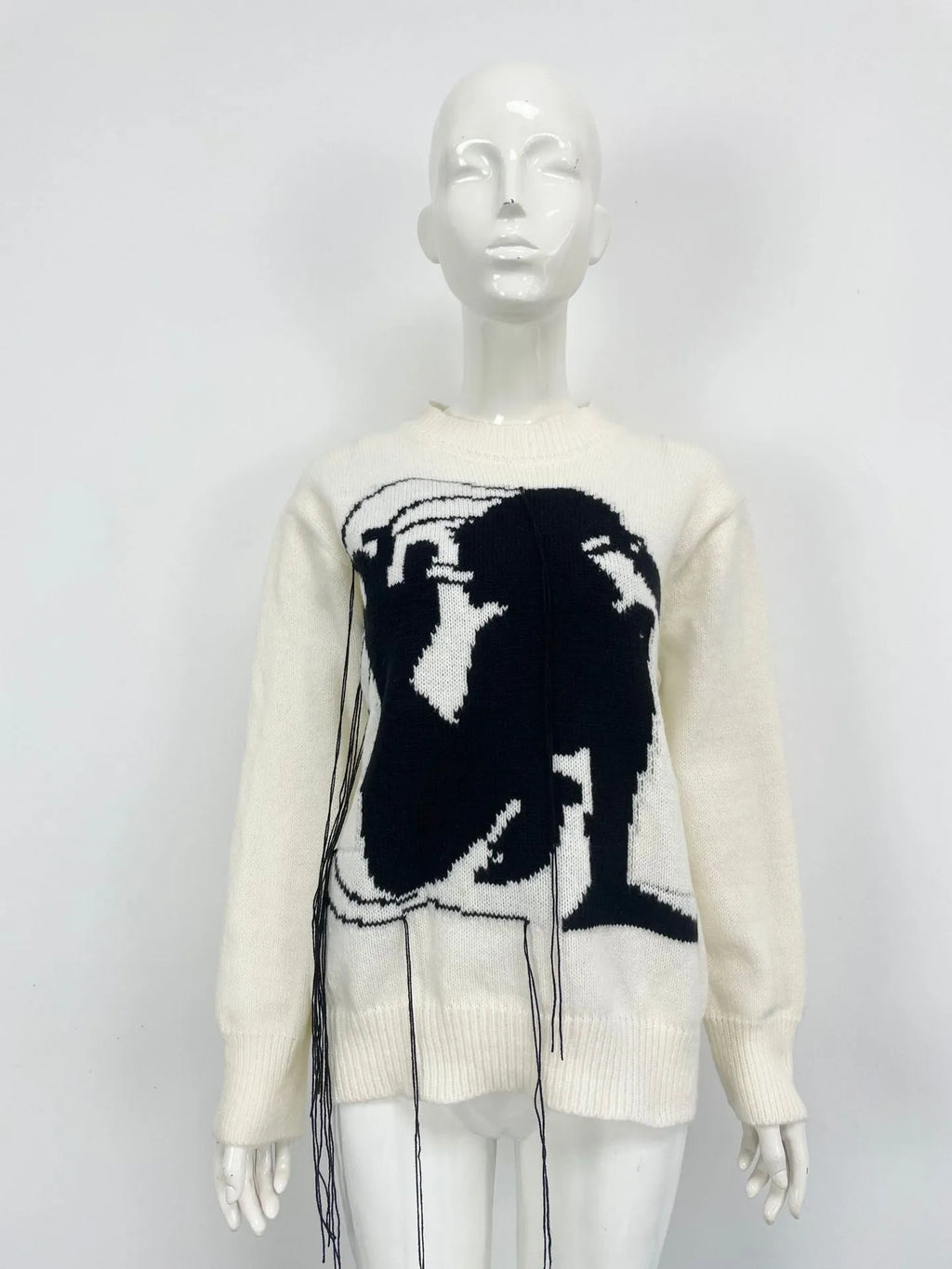 Grey women's alpaca wool sweater with abstract pattern and tassel design details