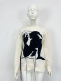 Grey women's alpaca wool sweater with abstract pattern and tassel design details