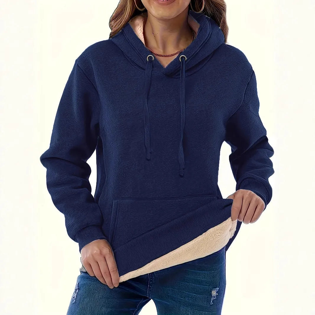 Women's thick grey hooded sweater with a 3D pattern and front pockets on a hanger.