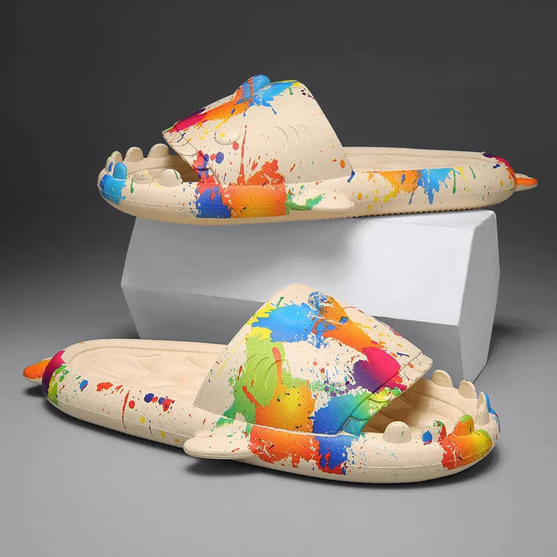 EVA open-toe shark-themed couple slippers in assorted colours on a white background.