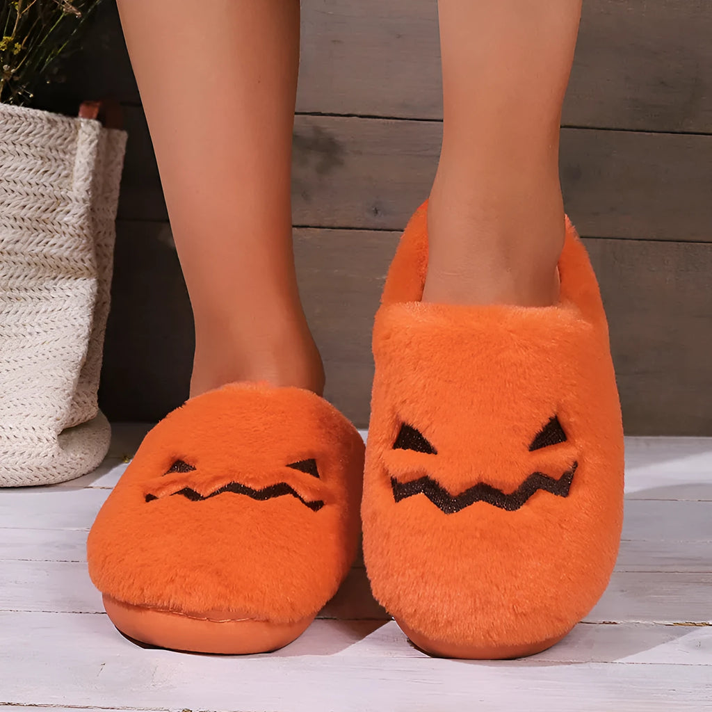 Orange Halloween pumpkin slippers with plush lining and non-slip PVC soles
