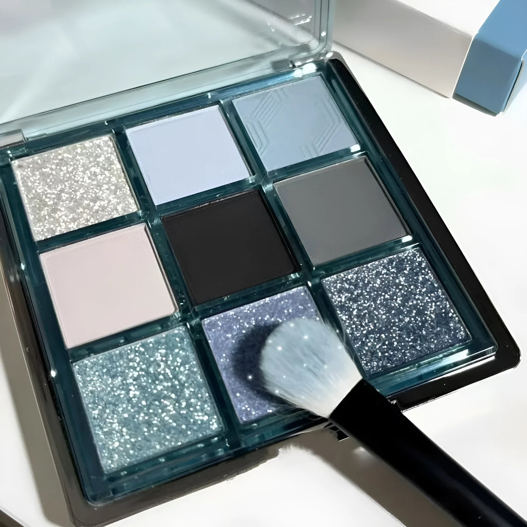 MUGELEEN nine-colour eye shadow palette 08 showing low saturation blue and earth tones with matte shimmer finishes