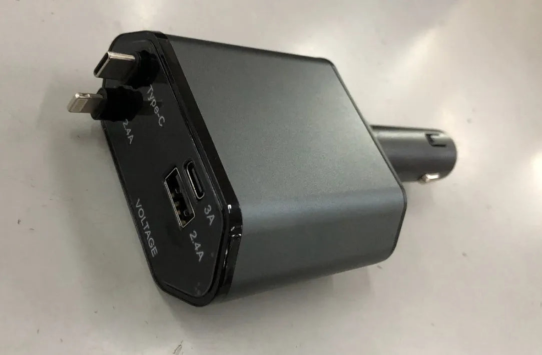 Retractable car charger with four-port USB adapter extending from vehicle cigarette lighter socket