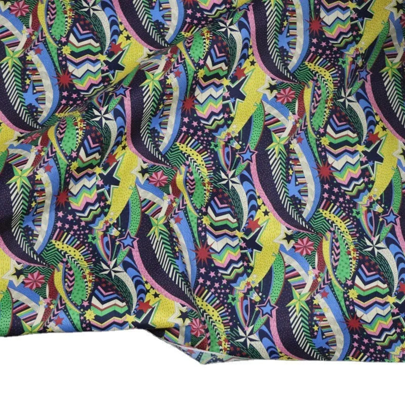 Blue digital printed cotton fabric with floral design measuring 145cm wide