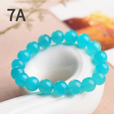 7A grade Amazonite natural stone scattered beads in various sizes from 6mm to 13mm with polished surfaces