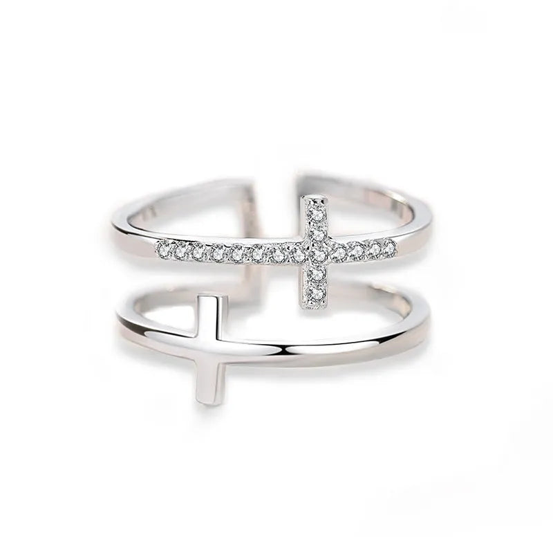 Women's adjustable copper ring with a double cross design and sparkling zircon inlays.