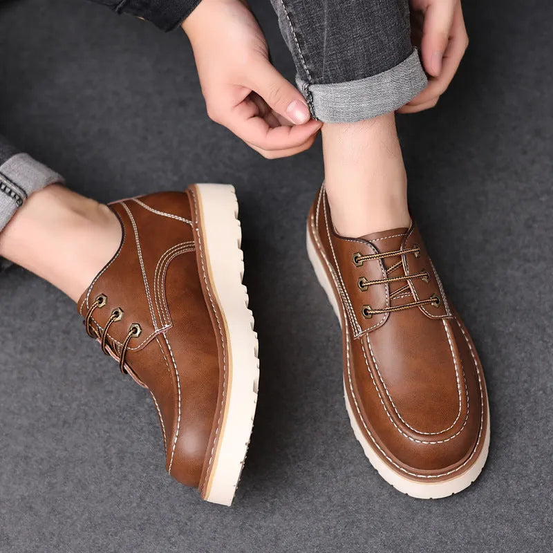Men's black retro low-top Martin boots with a round toe and non-slip rubber sole.