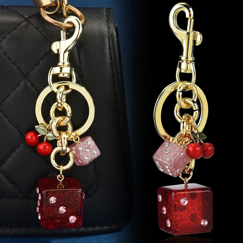 Square metal dice keychain pendant with cherry two-tone electroplated finish