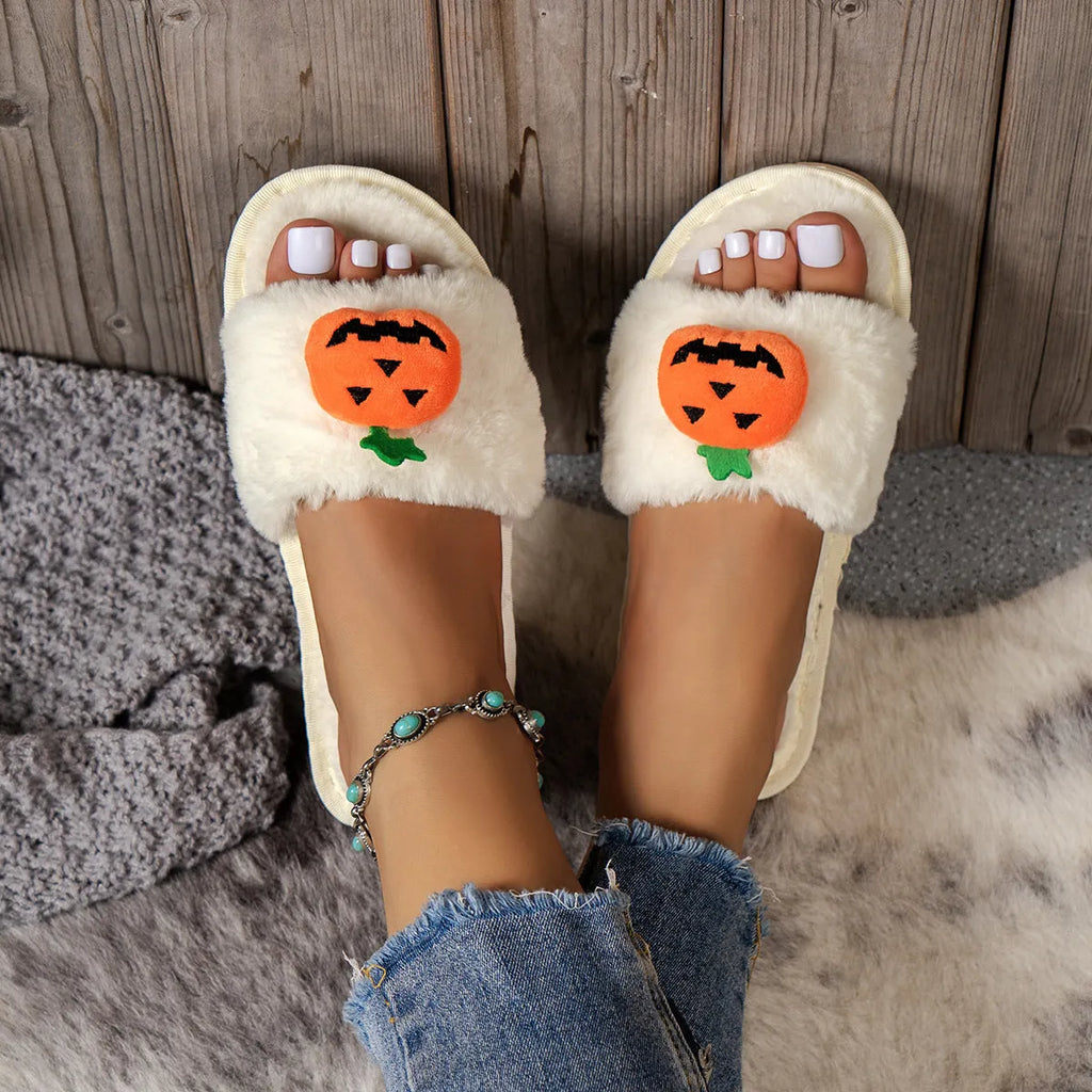 Yellow Halloween pumpkin cartoon design open toe slippers with soft synthetic fur upper.