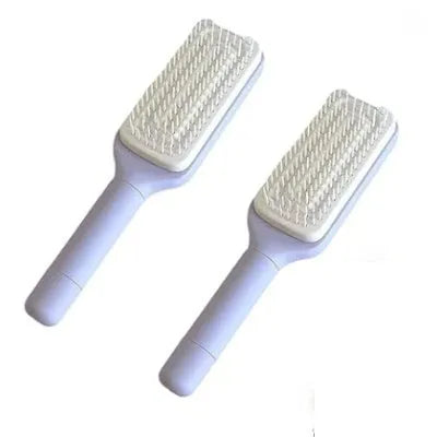 Roland purple self-cleaning hair brush with rotating handle and anti-static massage bristles.