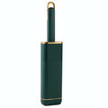 Blue reusable pet hair remover brush with a storage box base on a fabric sofa.
