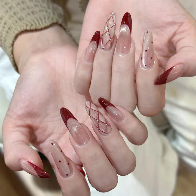 Set of sweet girl theme fake nails with colourful glitter and crystal decorations on a soft gel base.