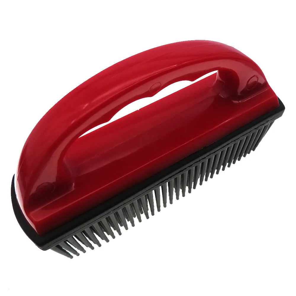Red handheld pet hair removal brush with rubber bristles for grooming dogs and cleaning carpets.