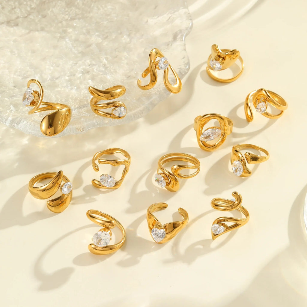 Geometric stainless steel zircon ring with open mouth design in electroplated finish