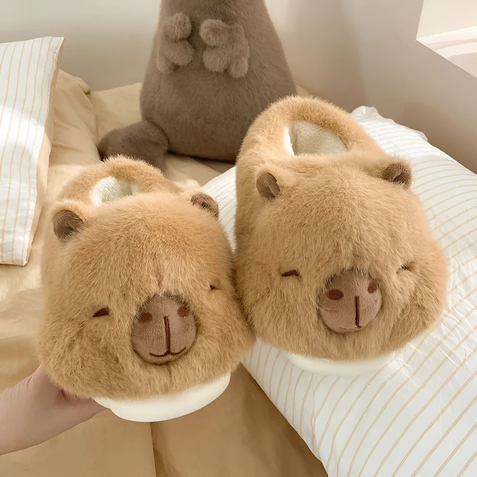 Light brown women's plush winter slippers with cartoon pattern, artificial wool lining and PVC soles