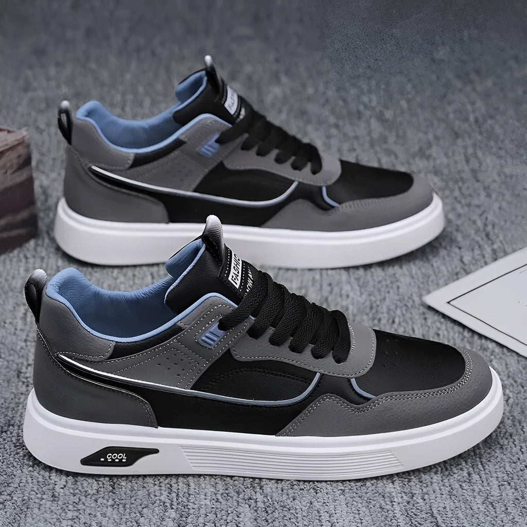 Men's low top canvas board shoes in beige with leather stitching detail and mesh lining