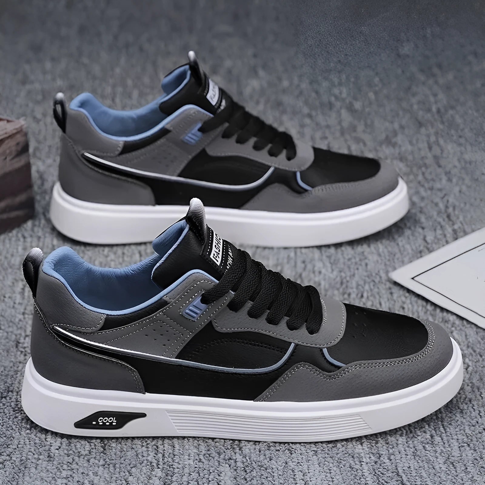 Men's low top canvas board shoes in beige with leather stitching detail and mesh lining