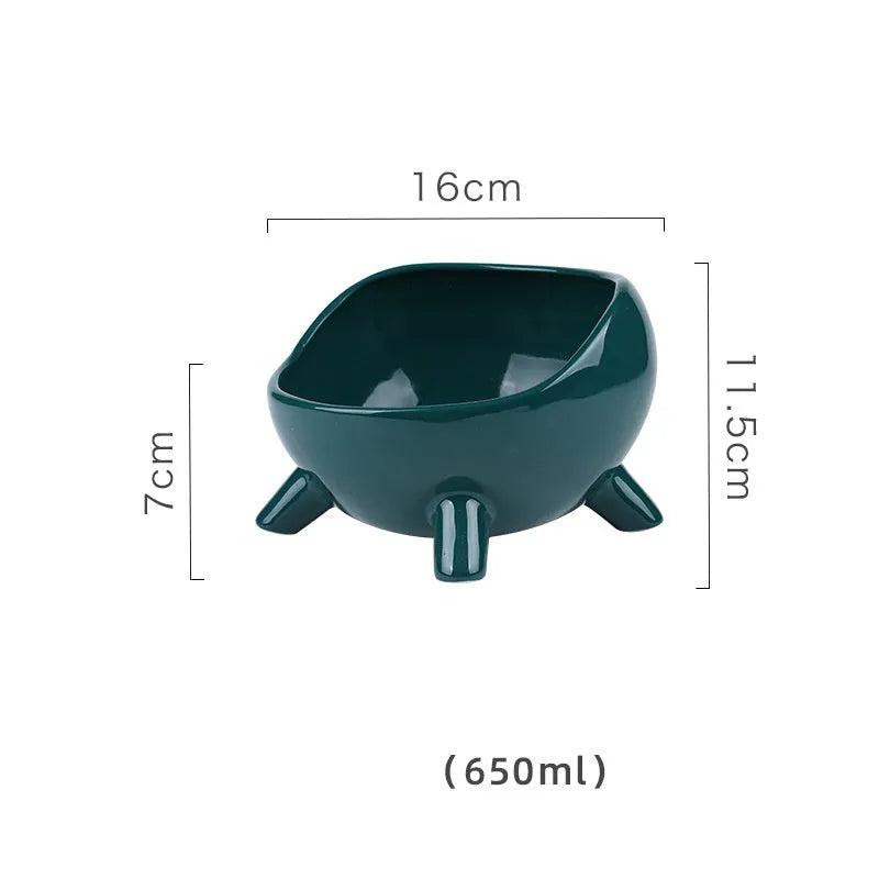 Green ceramic cat food bowl with four-legged stability base and wide mouth opening