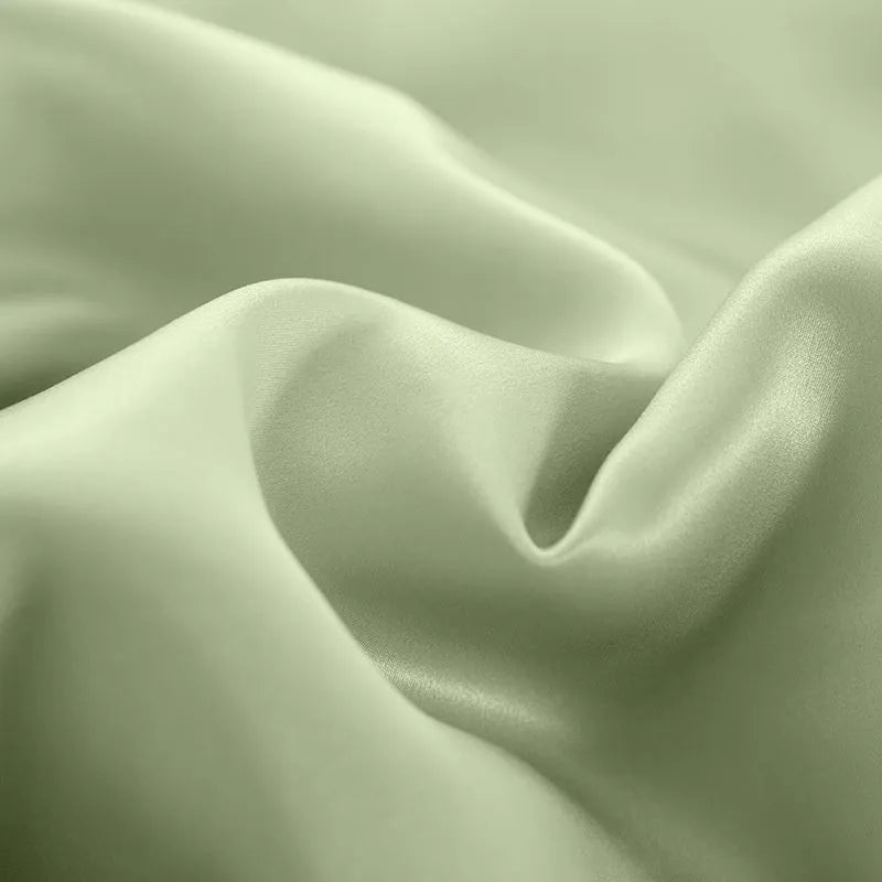 Silk duvet cover in lotus pink colour showing double-sided construction and plain weave texture