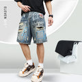 Blue ripped men's denim shorts with graffiti design and zipper fly