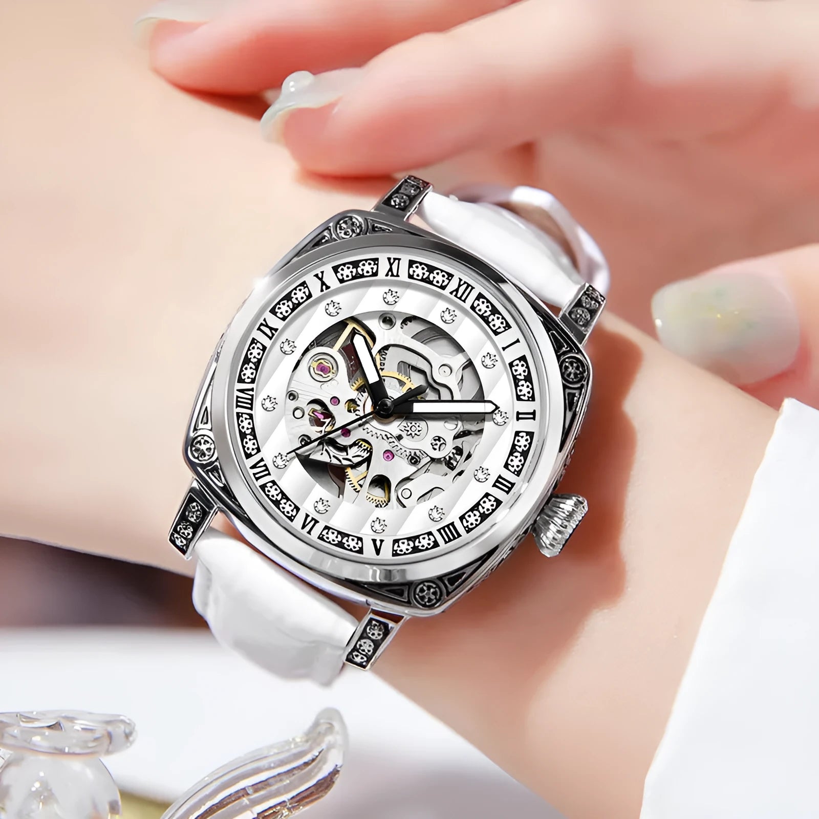 Men's leather strap mechanical watch with luminous hands on a black dial, showing water resistance and classic design.
