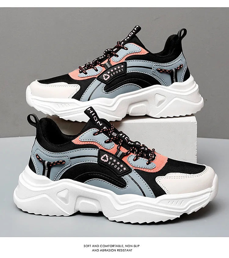 Women's white thick-soled casual sports shoes with mesh upper and buckle detail in Moonlight colour.
