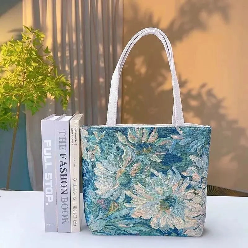 Double-sided gold wire embroidered canvas tote bag showing front and back design, available in multiple sizes and colours.