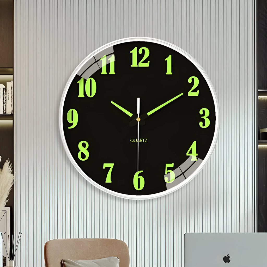 Modern round luminous wall clock 20cm diameter with plastic case on a wall