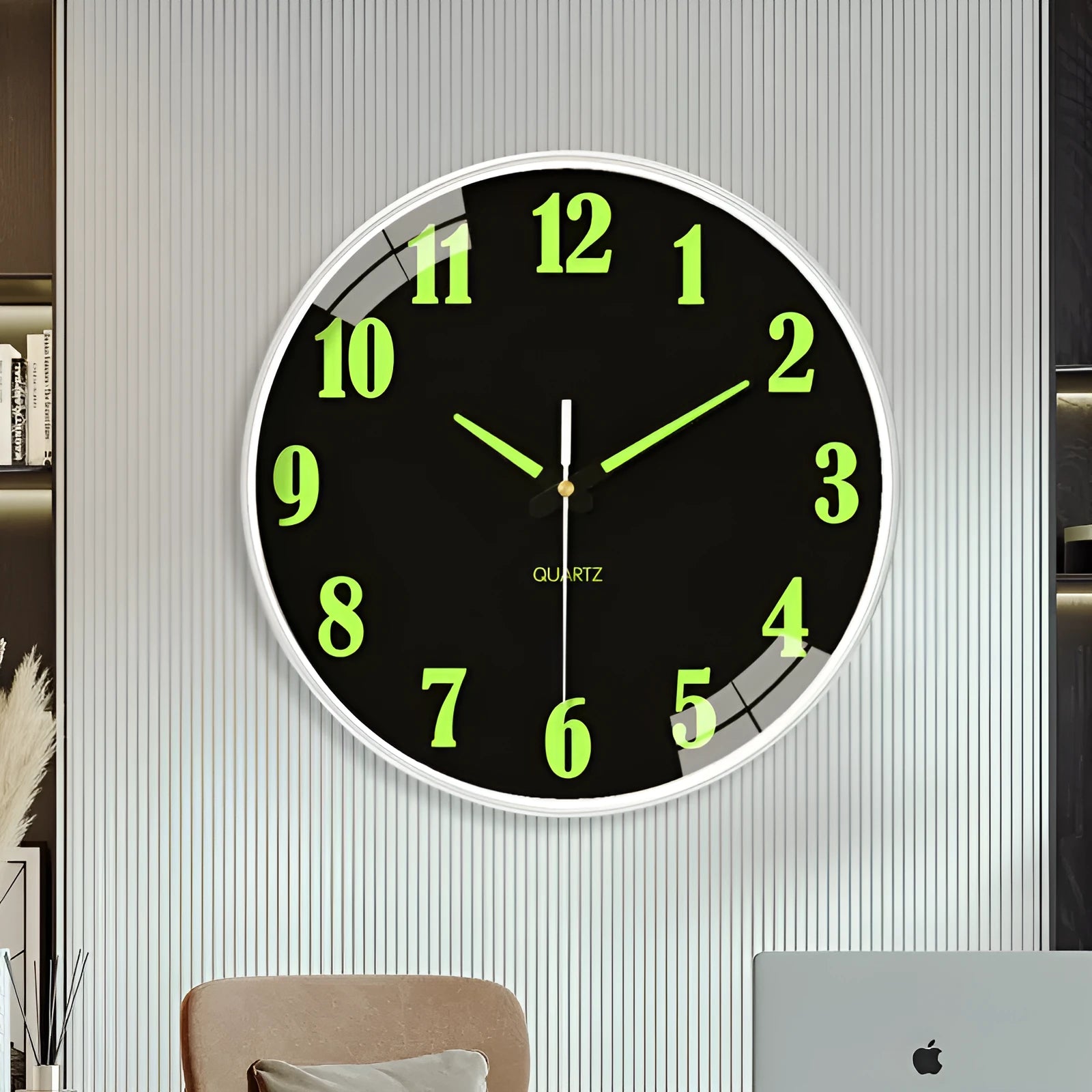 Modern round luminous wall clock 20cm diameter with plastic case on a wall