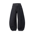 Men's wide leg denim trousers in original cow colour showing mid-waist design and relaxed fit