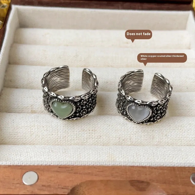 Adjustable opening heart ring in retro wide-faced moonlight style with white copper plated silver construction