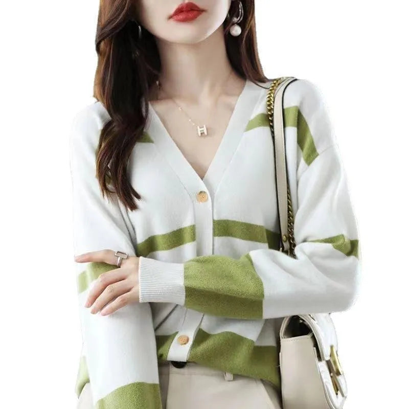 Women's slim fit striped cardigan with 3D pattern texture, V-neck, and button front closure.