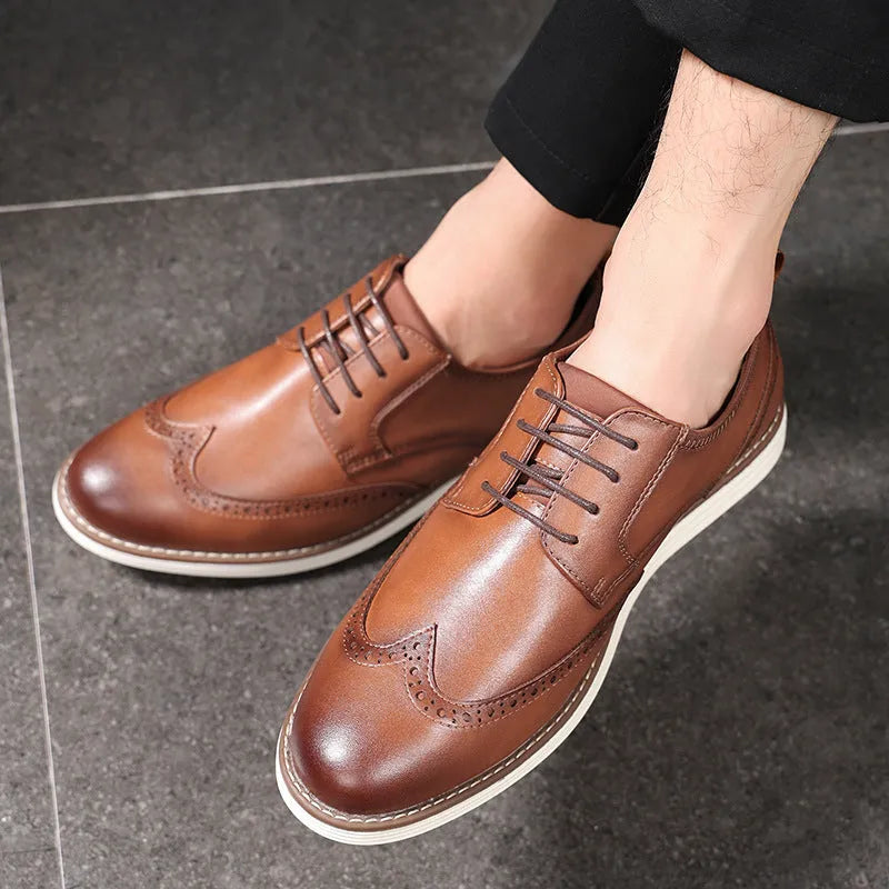Men's black and brown slip-on business casual shoes with PU upper and carved detailing