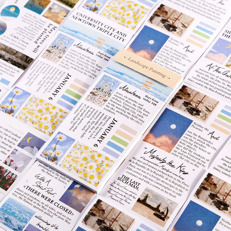 Paper stickers with landscape paintings measuring 60 by 120 millimetres