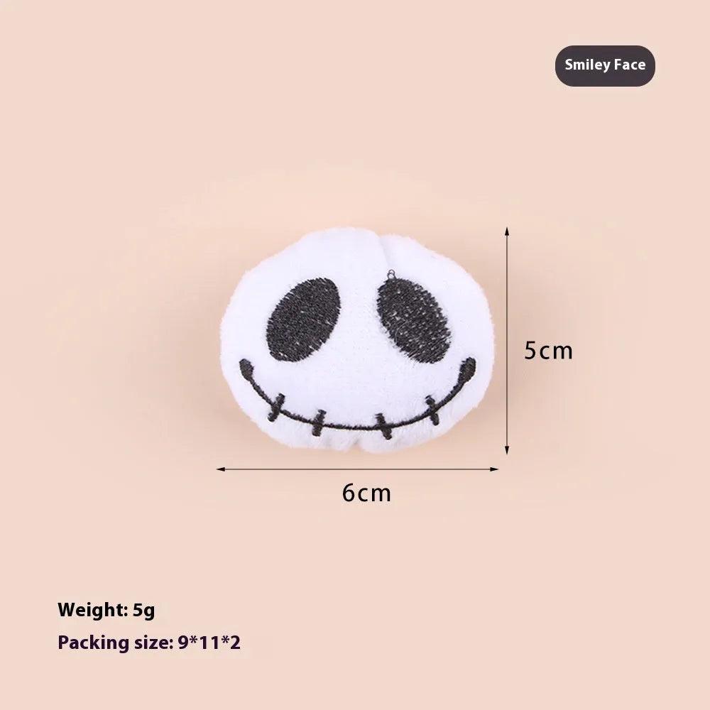 Small plush cat teaser toy with flexible handle in candy, eyes, or skull design