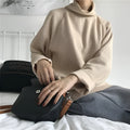 Women's loose fit half-high collar long sleeve top in solid colour on hanger