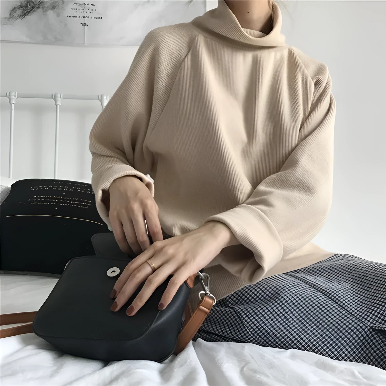 Women's loose fit half-high collar long sleeve top in solid colour on hanger