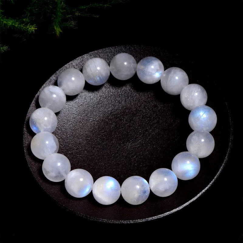 Natural blue moonlight stone round bead bracelet with geometric shapes and polished finish