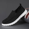Men's colour matching leather shoes with round toe and elastic band closure in black and white colour option