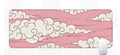 Large natural rubber desk mat with cloud pattern serving as mouse pad on office desk