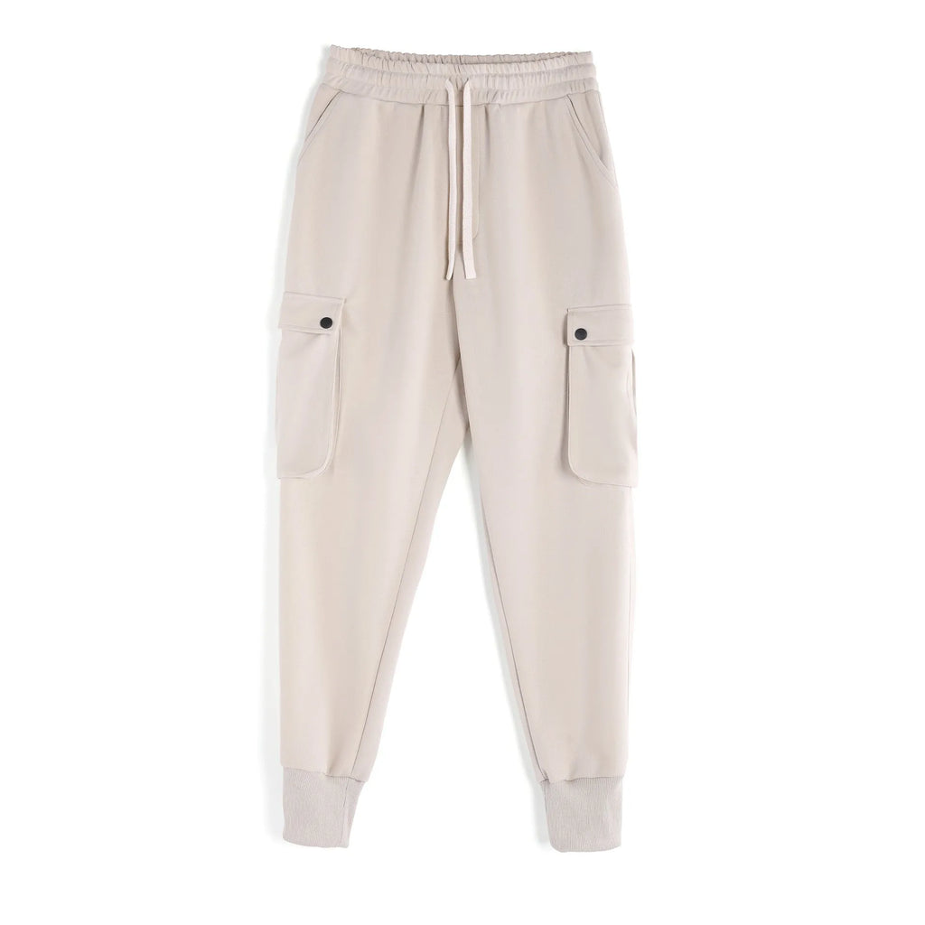 Men's loose fit multi-pocket cotton trousers with ankle ties in apricot colour